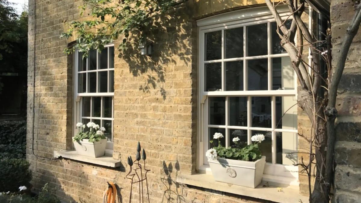 Detailed view of timber sliding sash window joinery showing mortise and tenon construction